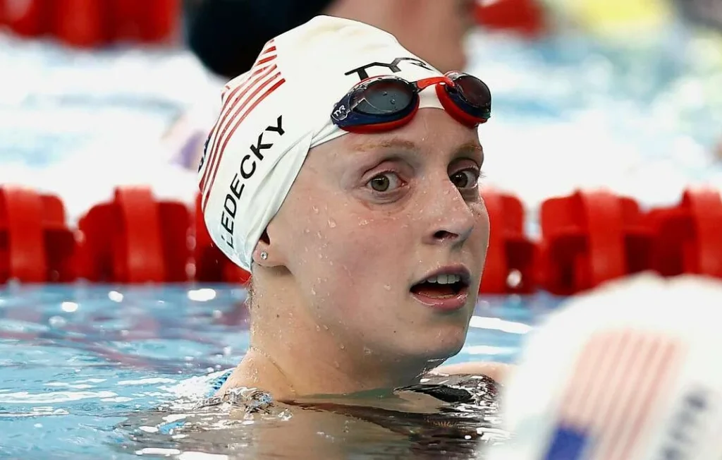Swimming Gold: The Inspiring Journeys of Professional Competitive Swimmers 4 katie ledecky viewing from water
