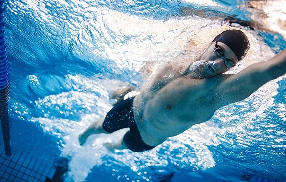 Swimming Gold: The Inspiring Journeys of Professional Competitive Swimmers 6 swimmer under water