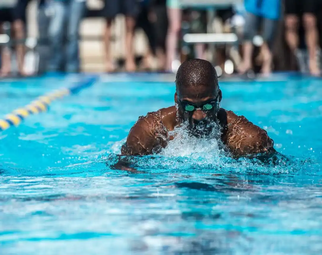 a man doing frog style swimming